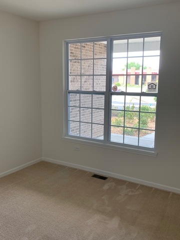 489 Ridge Road Bolingbrook, IL 60440 - Photo 29 of 34 an empty room with a window
