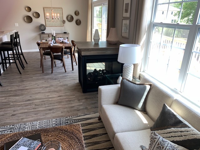 489 Ridge Road Bolingbrook, IL 60440 - Photo 5 of 34 a living room with furniture and a fireplace