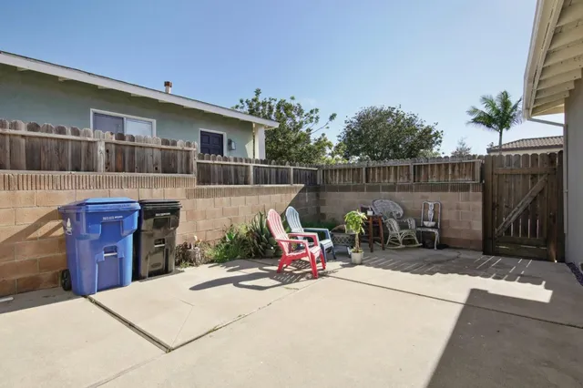a view of backyard and deck