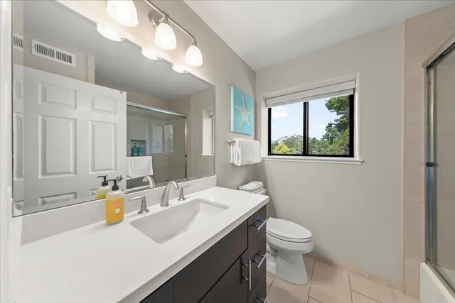 a view of a swimming pool with a yard and outdoor seating