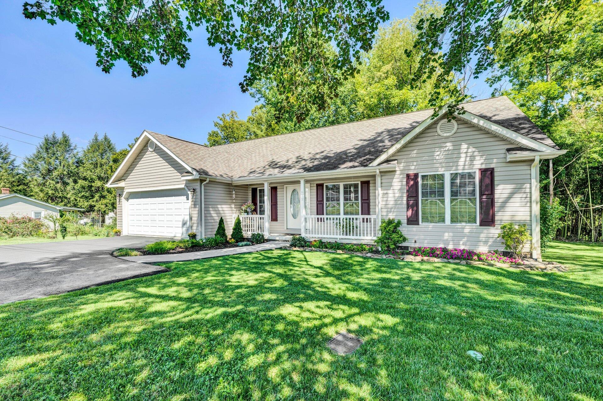 672 Kessler Mill Road Salem, VA 24153 - Photo 1 of 44 a front view of house with yard and green space