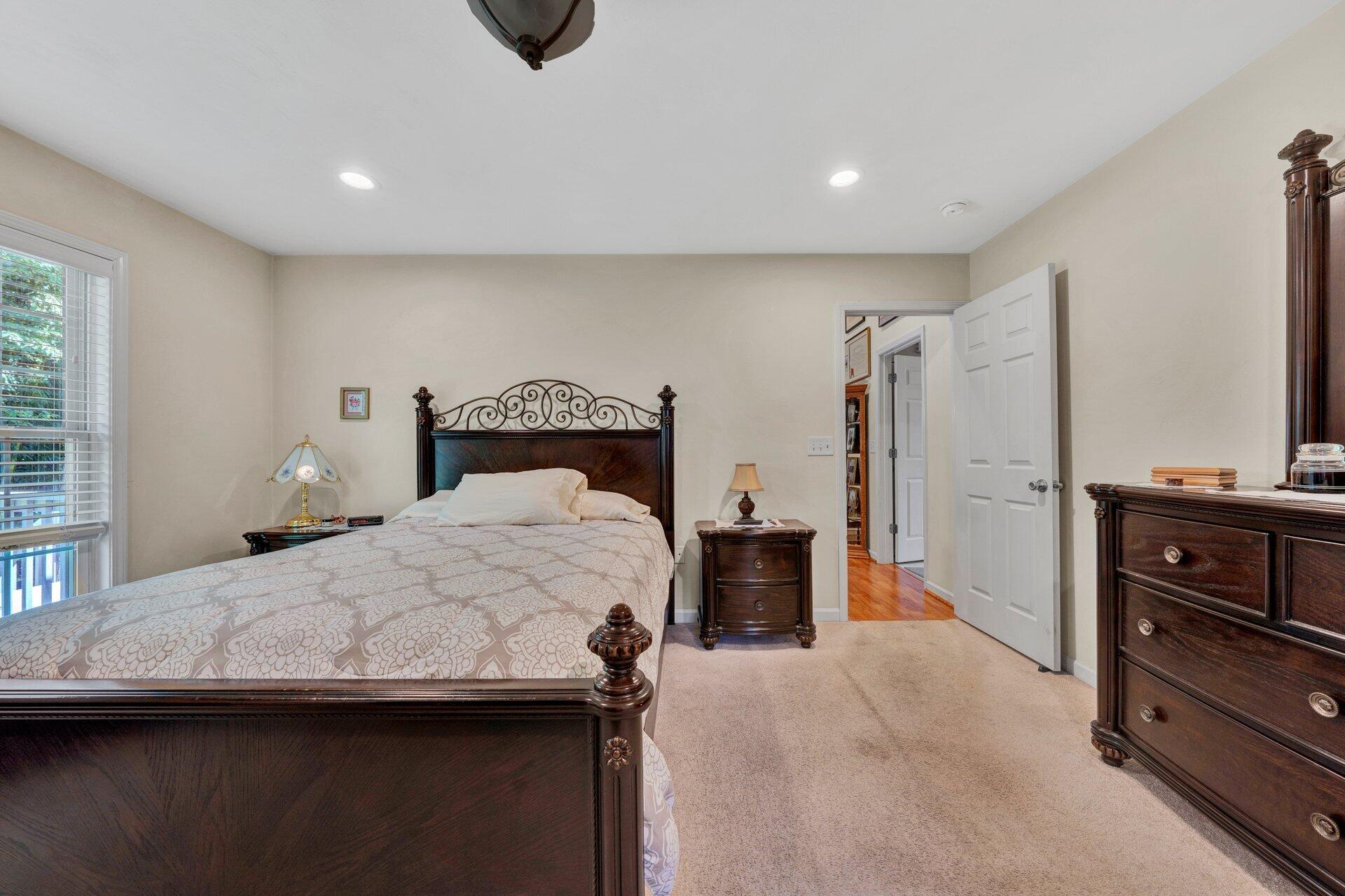 672 Kessler Mill Road Salem, VA 24153 - Photo 17 of 44 a bedroom with a bed and a television