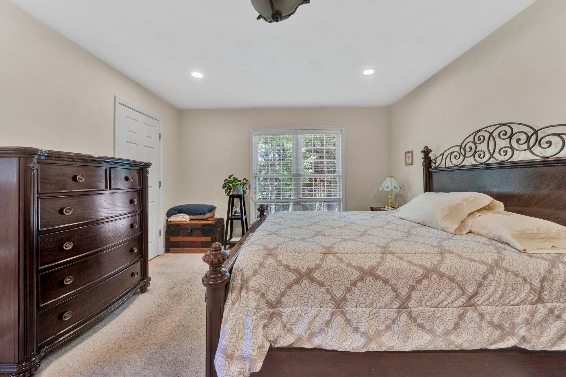 672 Kessler Mill Road Salem, VA 24153 - Photo 18 of 44 a bedroom with a bed and a window