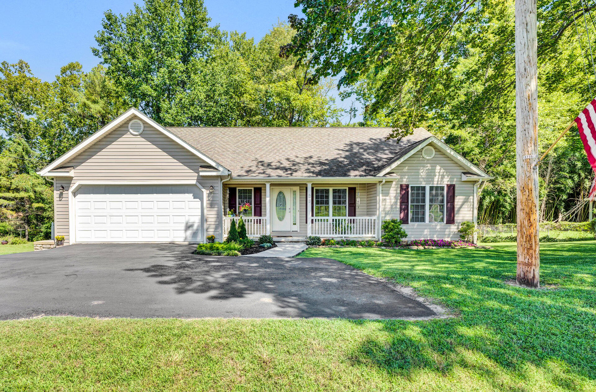 672 Kessler Mill Road Salem, VA 24153 - Photo 2 of 44 a front view of a house with a yard and porch