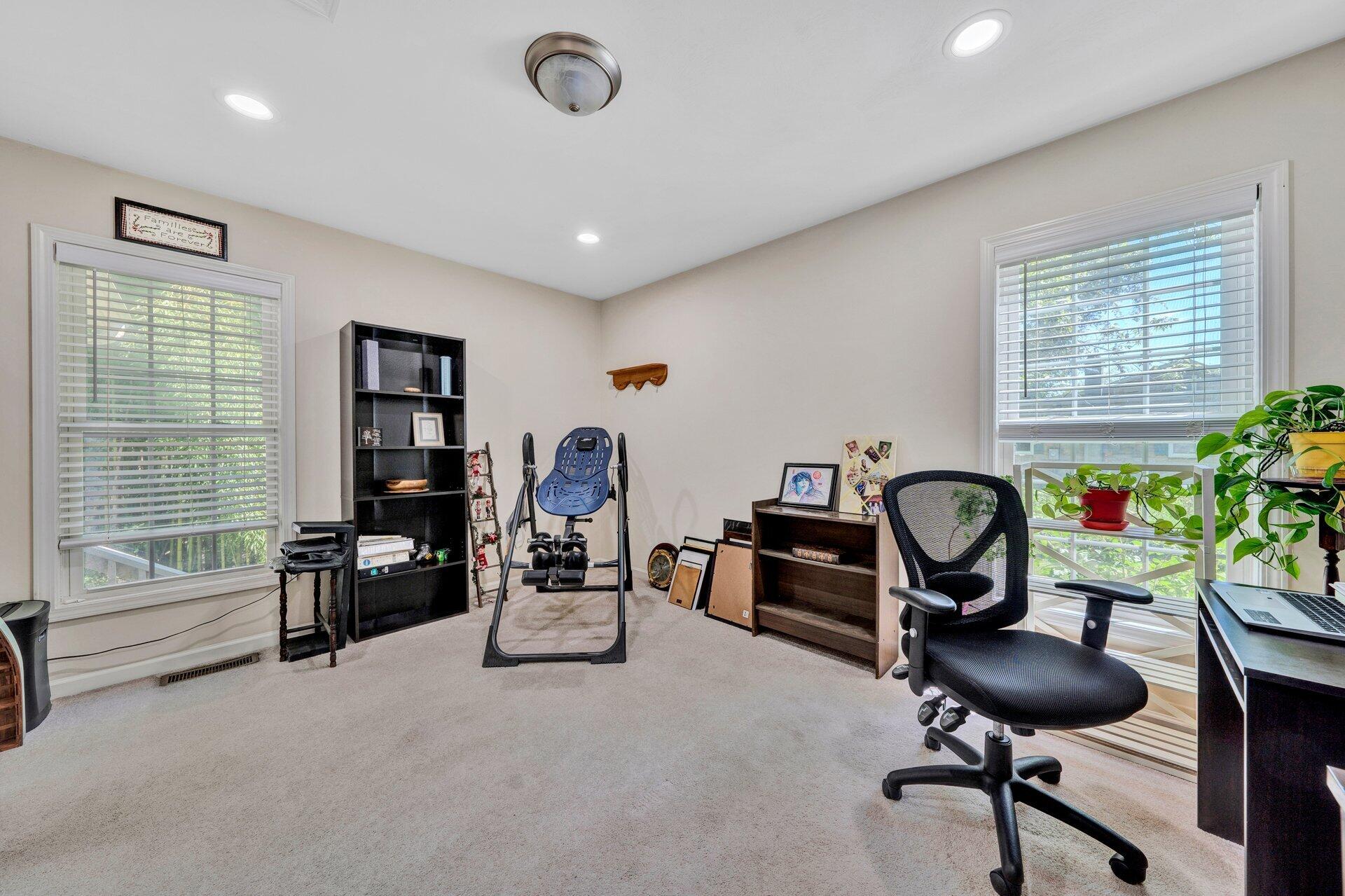 672 Kessler Mill Road Salem, VA 24153 - Photo 26 of 44 a view of a workspace with furniture and a window