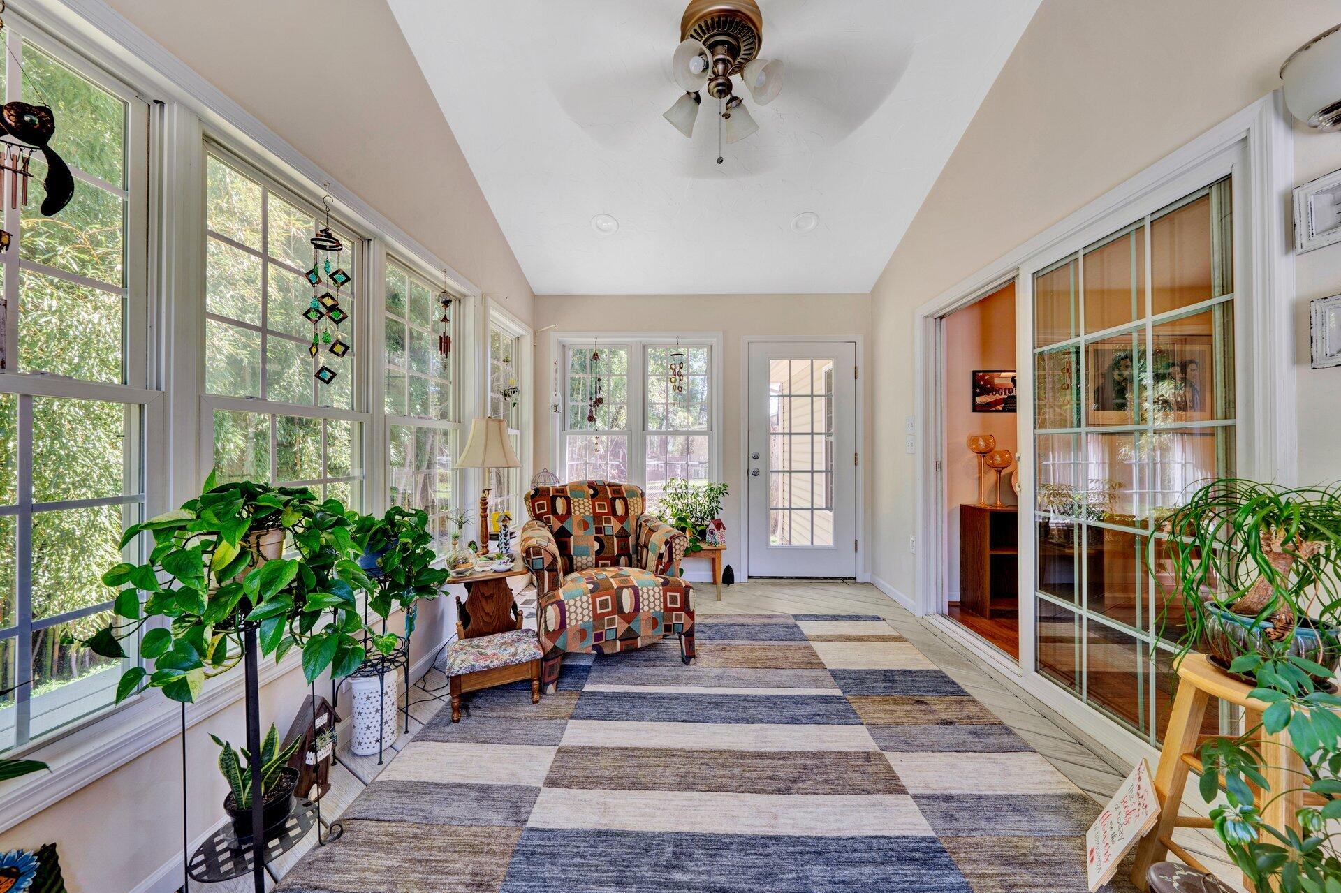 672 Kessler Mill Road Salem, VA 24153 - Photo 29 of 44 a living room filled with furniture and a potted plant