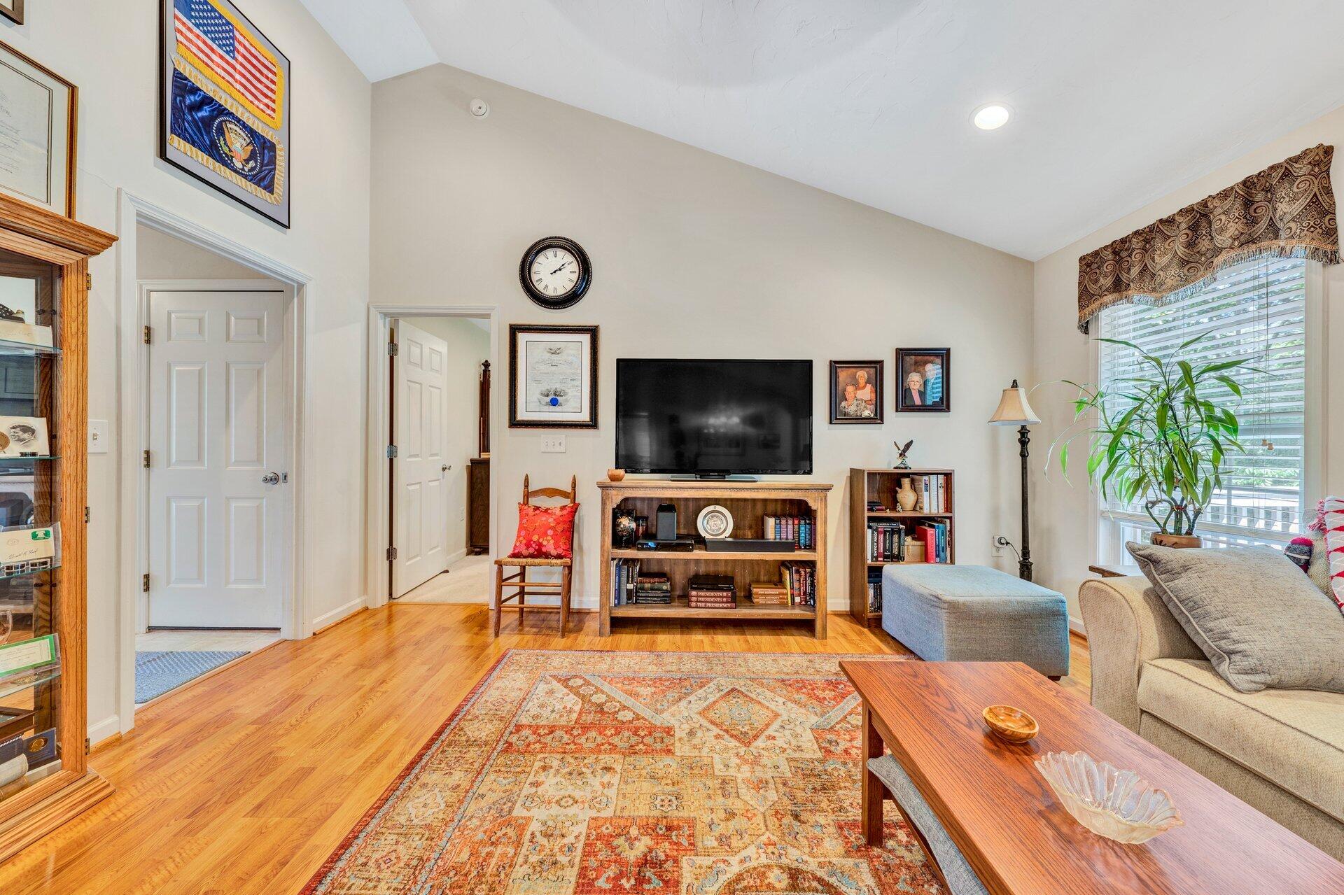 672 Kessler Mill Road Salem, VA 24153 - Photo 6 of 44 a living room with furniture and a flat screen tv