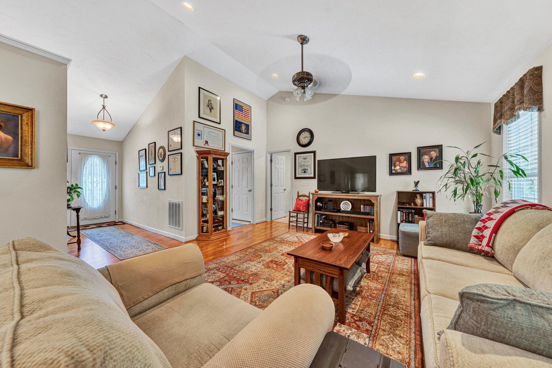 672 Kessler Mill Road Salem, VA 24153 - Photo 7 of 44 a living room with furniture and a flat screen tv