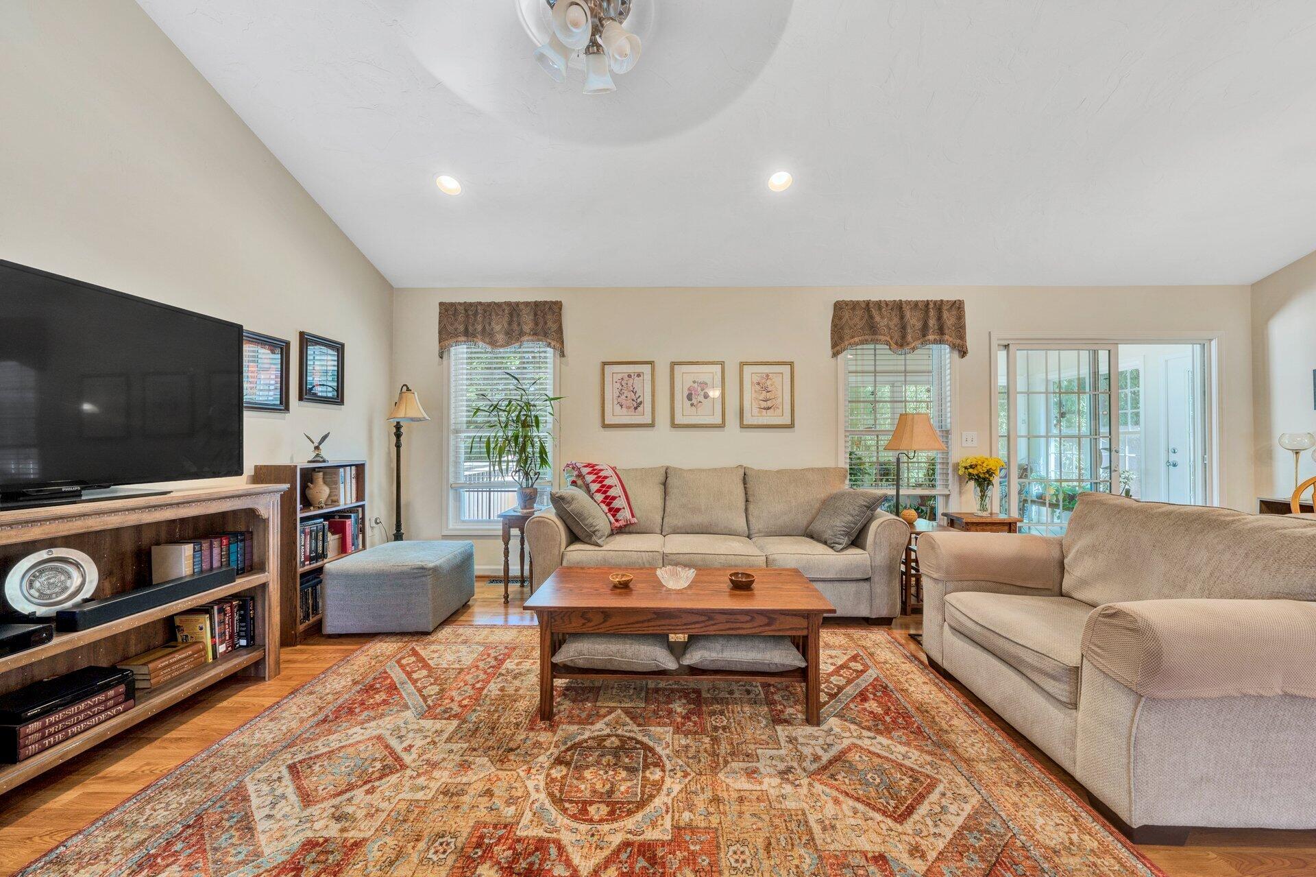 672 Kessler Mill Road Salem, VA 24153 - Photo 8 of 44 a living room with furniture and a flat screen tv