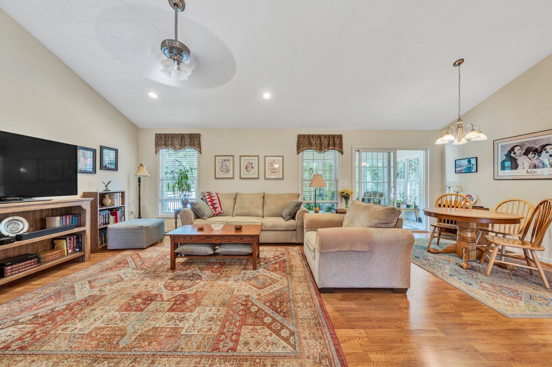 672 Kessler Mill Road Salem, VA 24153 - Photo 9 of 44 a living room with furniture and a flat screen tv