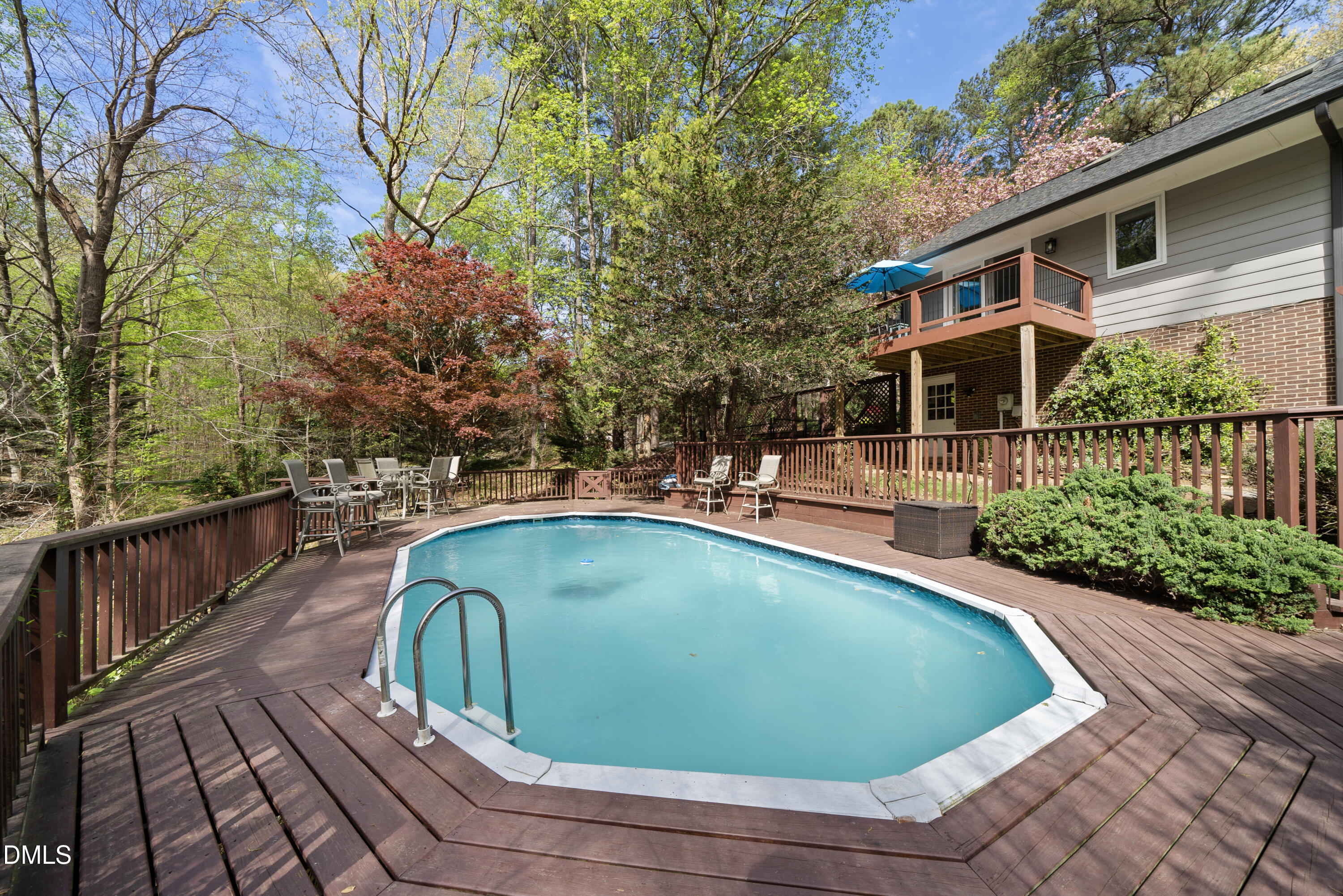 6200 Splitrock Trail Apex, NC 27539 - Photo 38 of 64 a view of a swimming pool with a patio