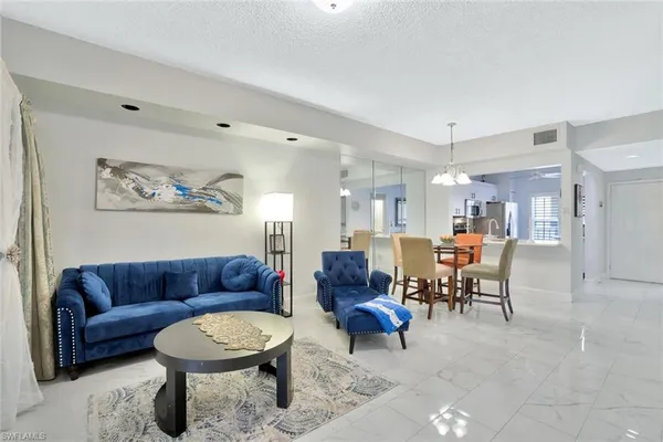 $2,000 | 1018 Woodshire Lane, Unit A210, Naples, FL 34105
