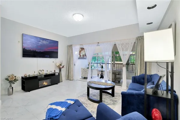 $2,000 | 1018 Woodshire Lane, Unit A210, Naples, FL 34105