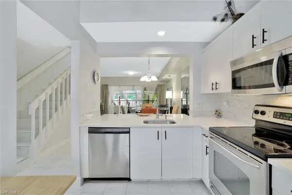 $2,000 | 1018 Woodshire Lane, Unit A210, Naples, FL 34105