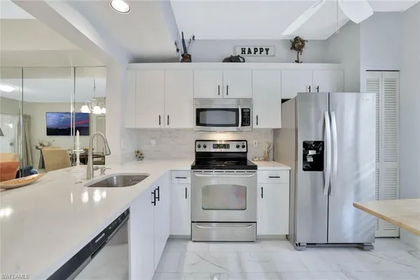 $2,000 | 1018 Woodshire Lane, Unit A210, Naples, FL 34105