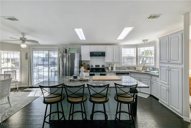 a view of a balcony with chairs