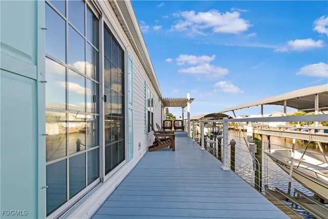 a view of a balcony with chairs