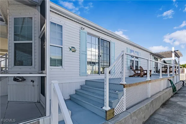 a spacious bathroom with a sink a large mirror and a bathtub