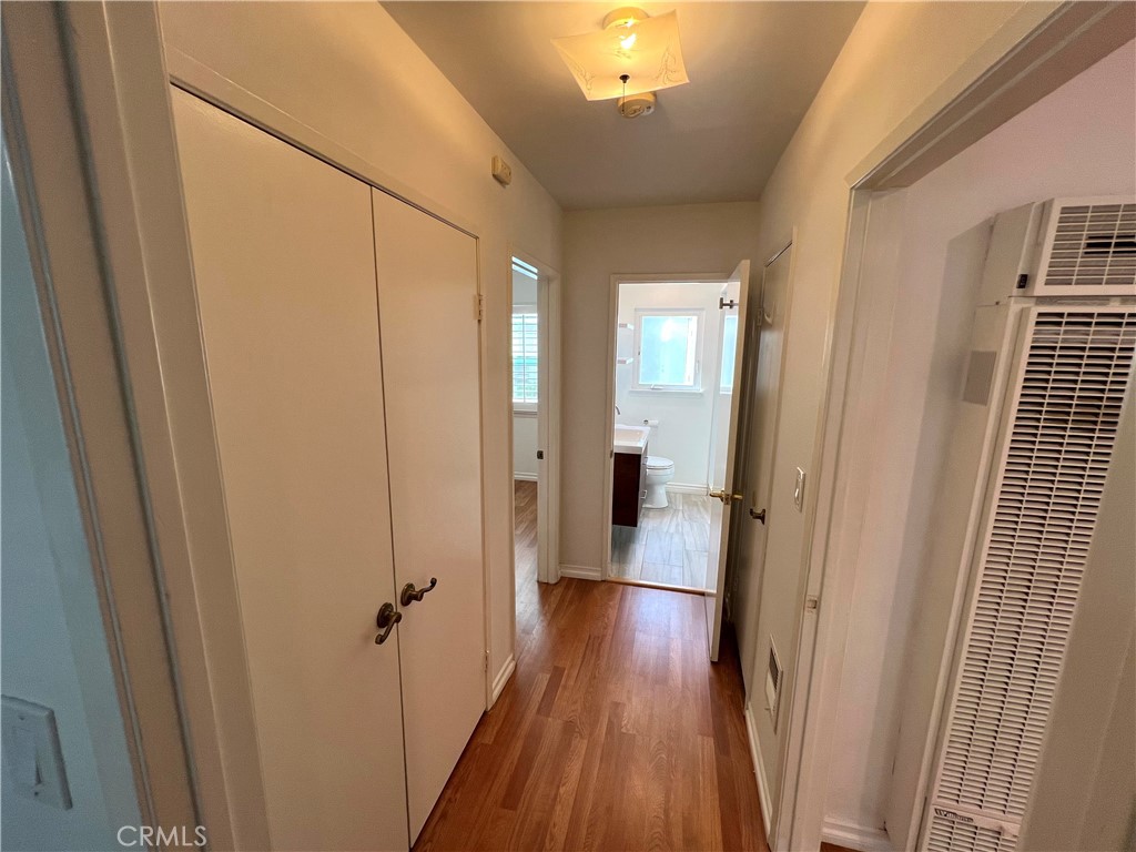 5835 Bowcroft Street, Unit 2 Los Angeles, CA 90016 - Photo 12 of 30 a view of a hallway with wooden floor