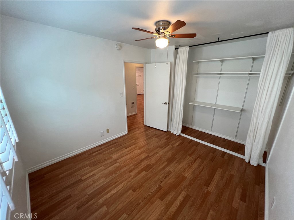 5835 Bowcroft Street, Unit 2 Los Angeles, CA 90016 - Photo 17 of 30 wooden floor in an empty room with a window