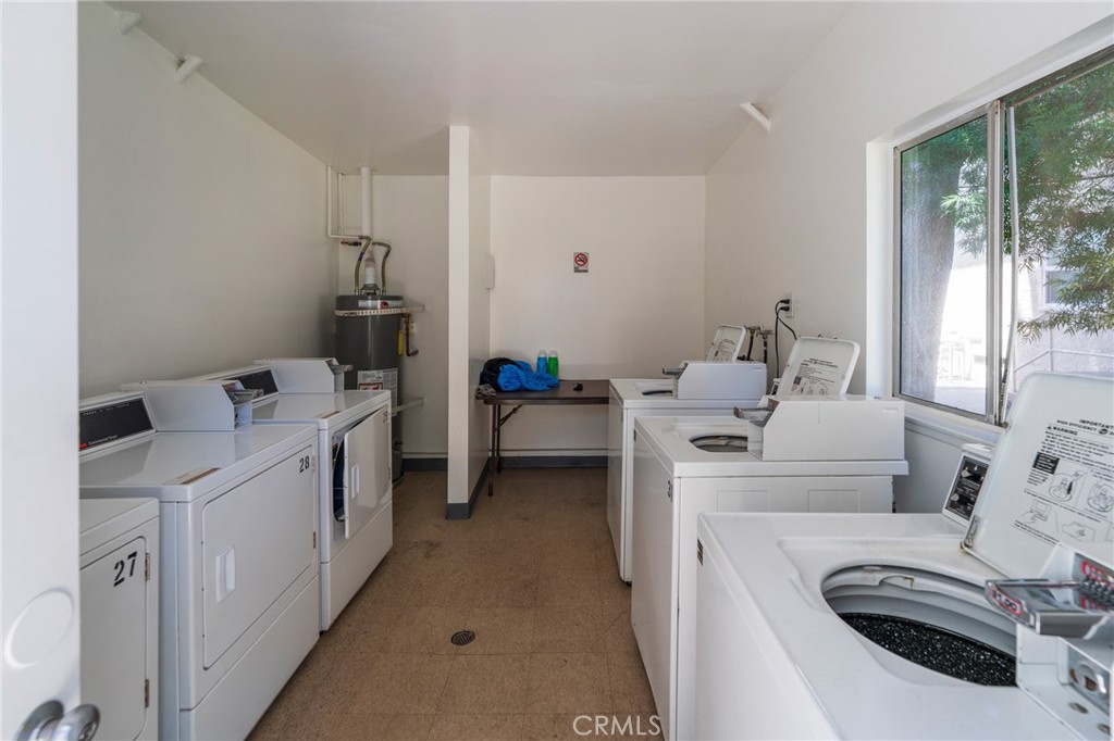 5835 Bowcroft Street, Unit 2 Los Angeles, CA 90016 - Photo 26 of 30 a view of washer and dryer with bathroom in the background