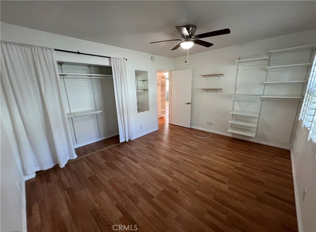 5835 Bowcroft Street, Unit 2 Los Angeles, CA 90016 - Photo 10 of 30 wooden floor in an empty room with a window