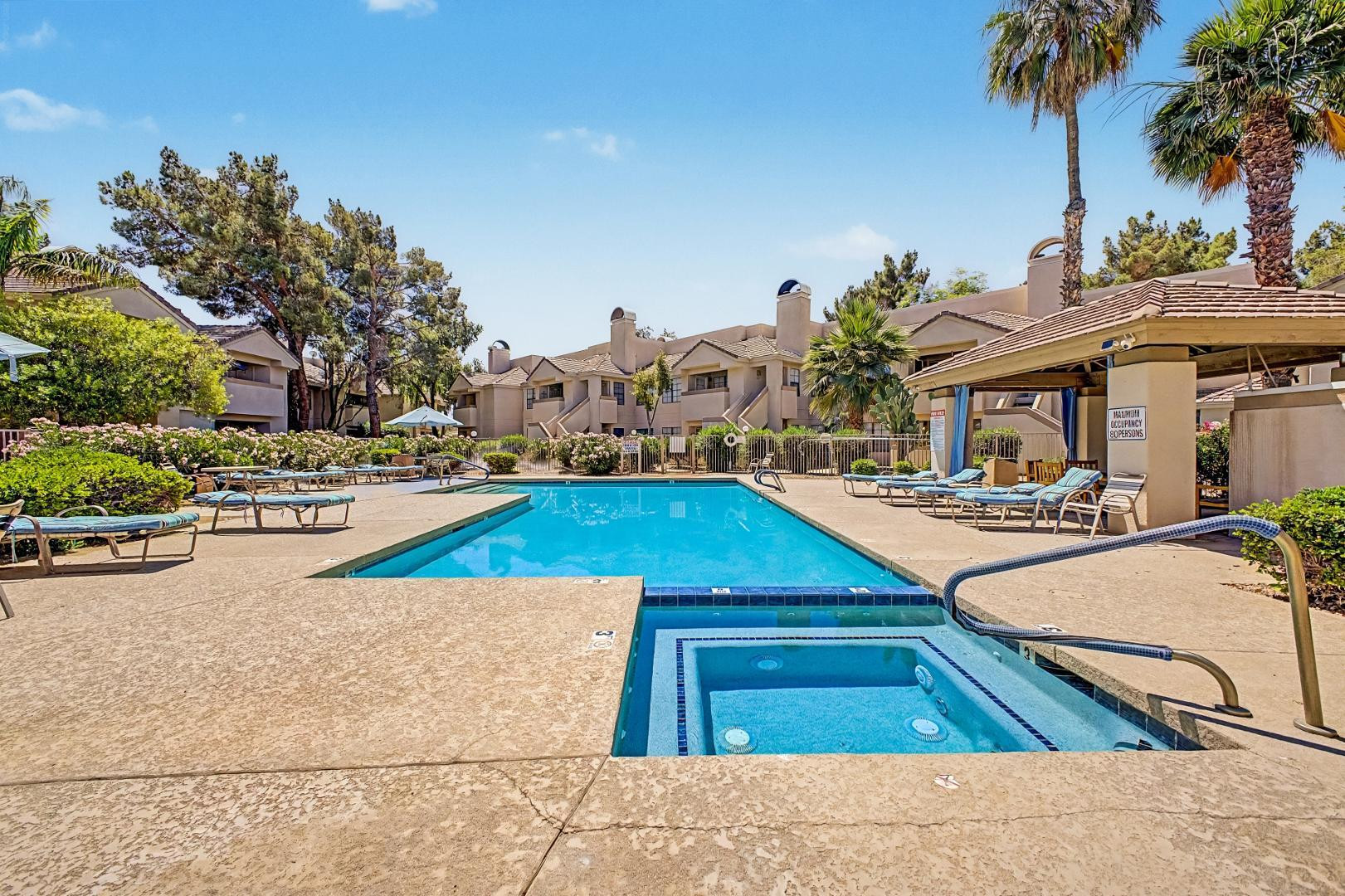 6885 East Cochise Road, Unit 142 Paradise Valley, AZ 85253 - Photo 39 of 47 a swimming pool with outdoor seating and yard