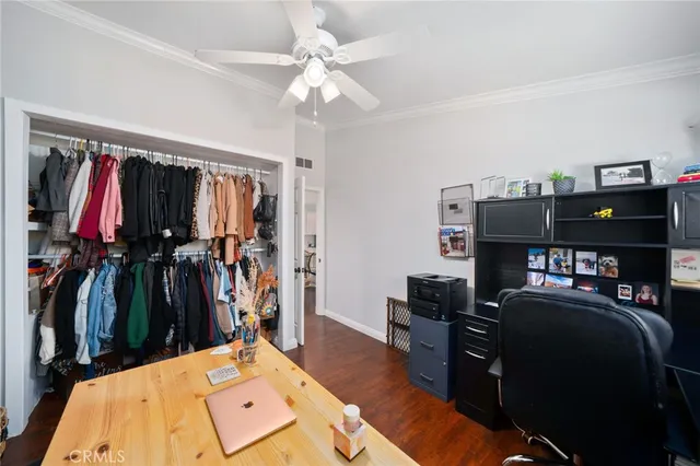 a bed room with a bed and a book shelf