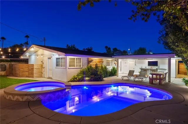 a view of a red chairs in a patio