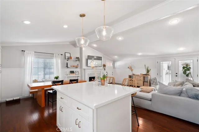 a view of a kitchen and living room