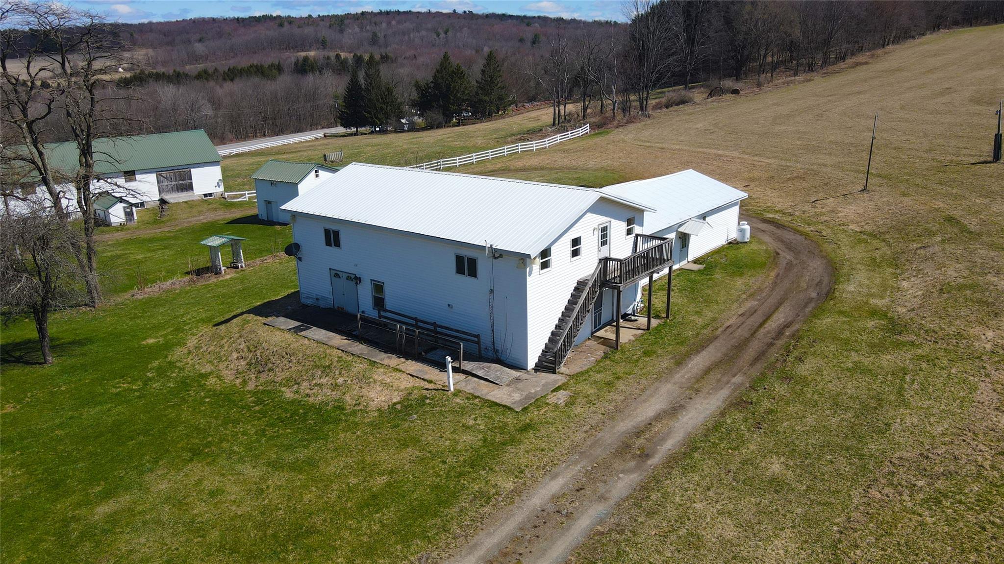 892 Bowbell Road Greene, NY 13778 - Photo 23 of 35 View of rural area featuring a forest