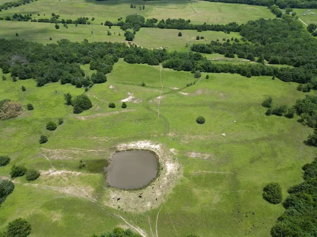 a view of a golf ground with a yard