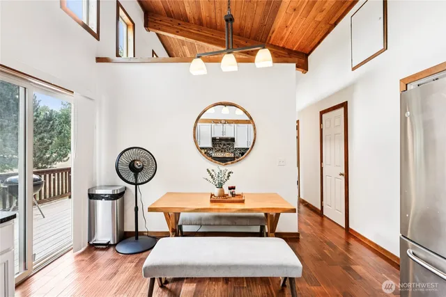 a room with furniture a rug and a window