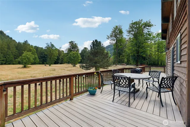 a view of balcony with furniture