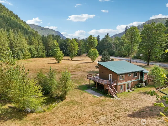 a view of a bench in front of house