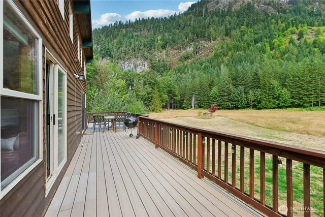 a view of balcony with wooden floor