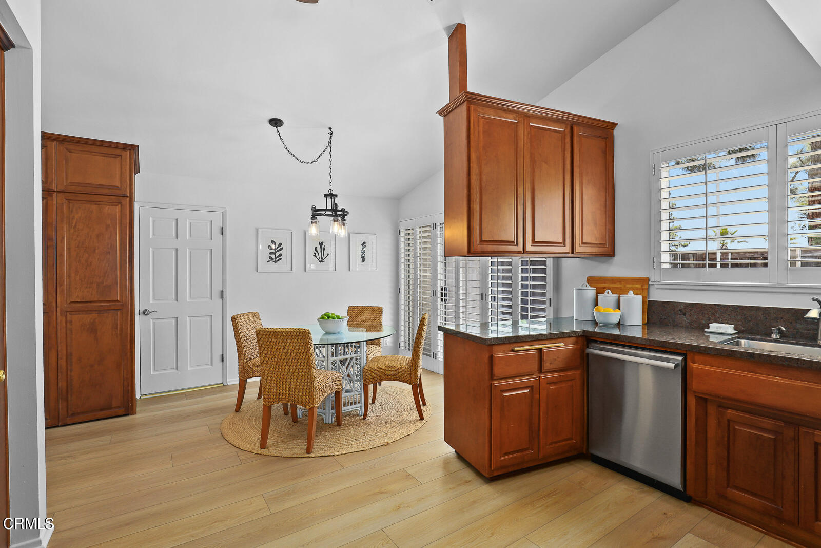 1535 Washburn Road Pasadena, CA 91105 - Photo 6 of 31 a kitchen with stainless steel appliances granite countertop a sink dishwasher a microwave oven and a dining table with wooden cabinet