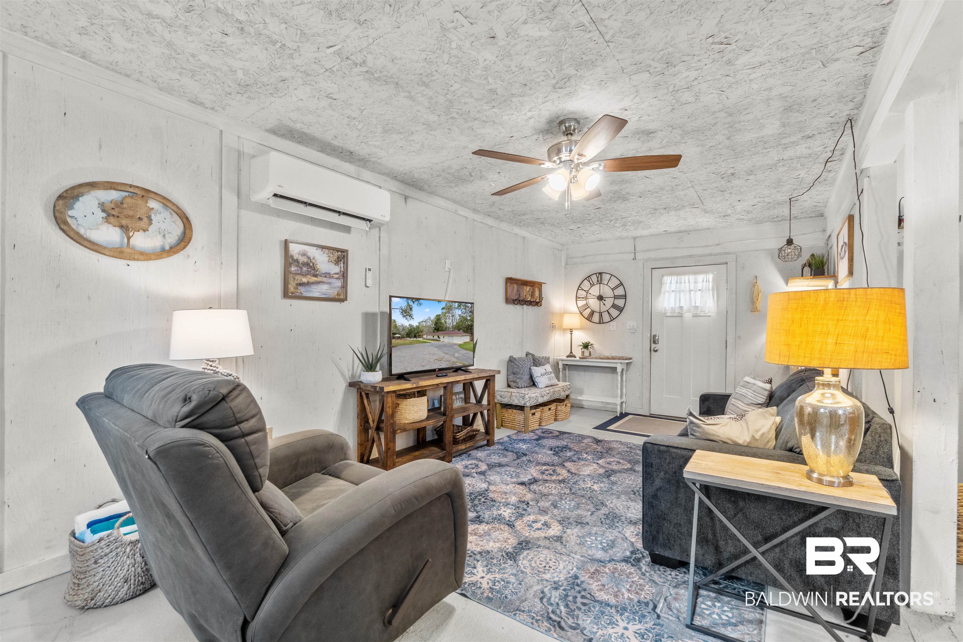 17595 River Road Summerdale, AL 36580 - Photo 3 of 29 Living room with ceiling fan and a mini split for heating / cooling
