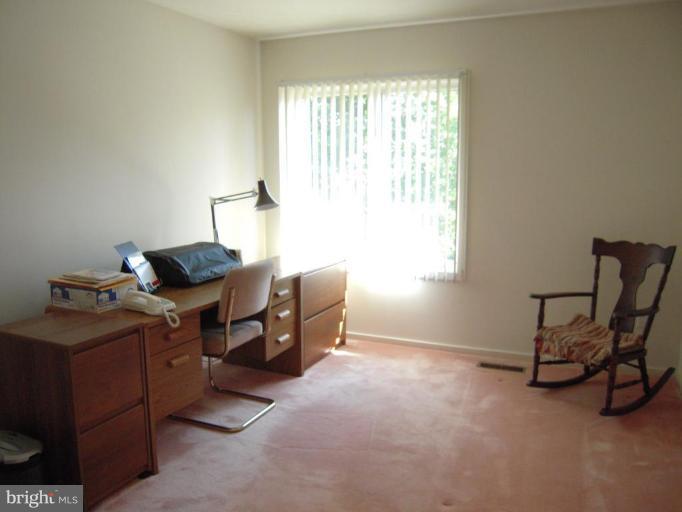 11509 Hemingway Drive Reston, VA 20194 - Photo 14 of 21 a workspace with furniture and a window