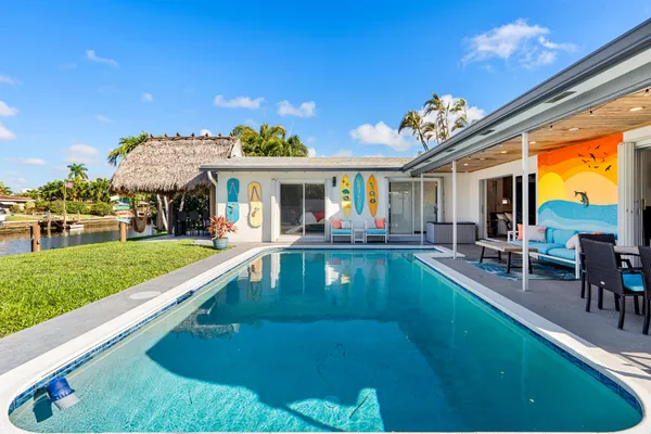 a view of a house with a swimming pool