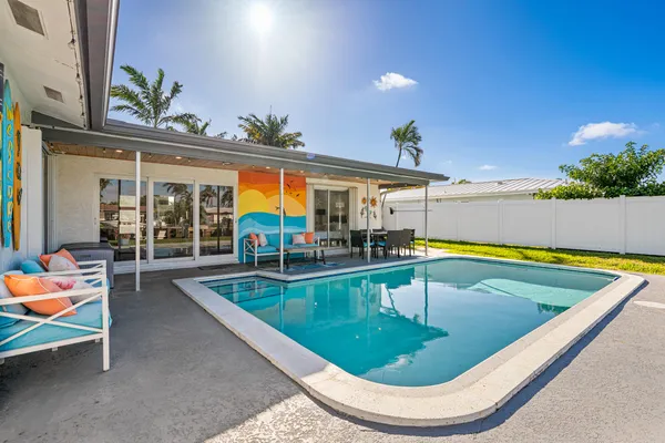 swimming pool view with seating space