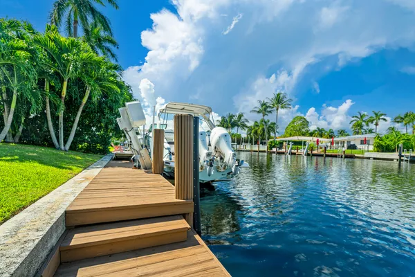 a view of a lake with a yard