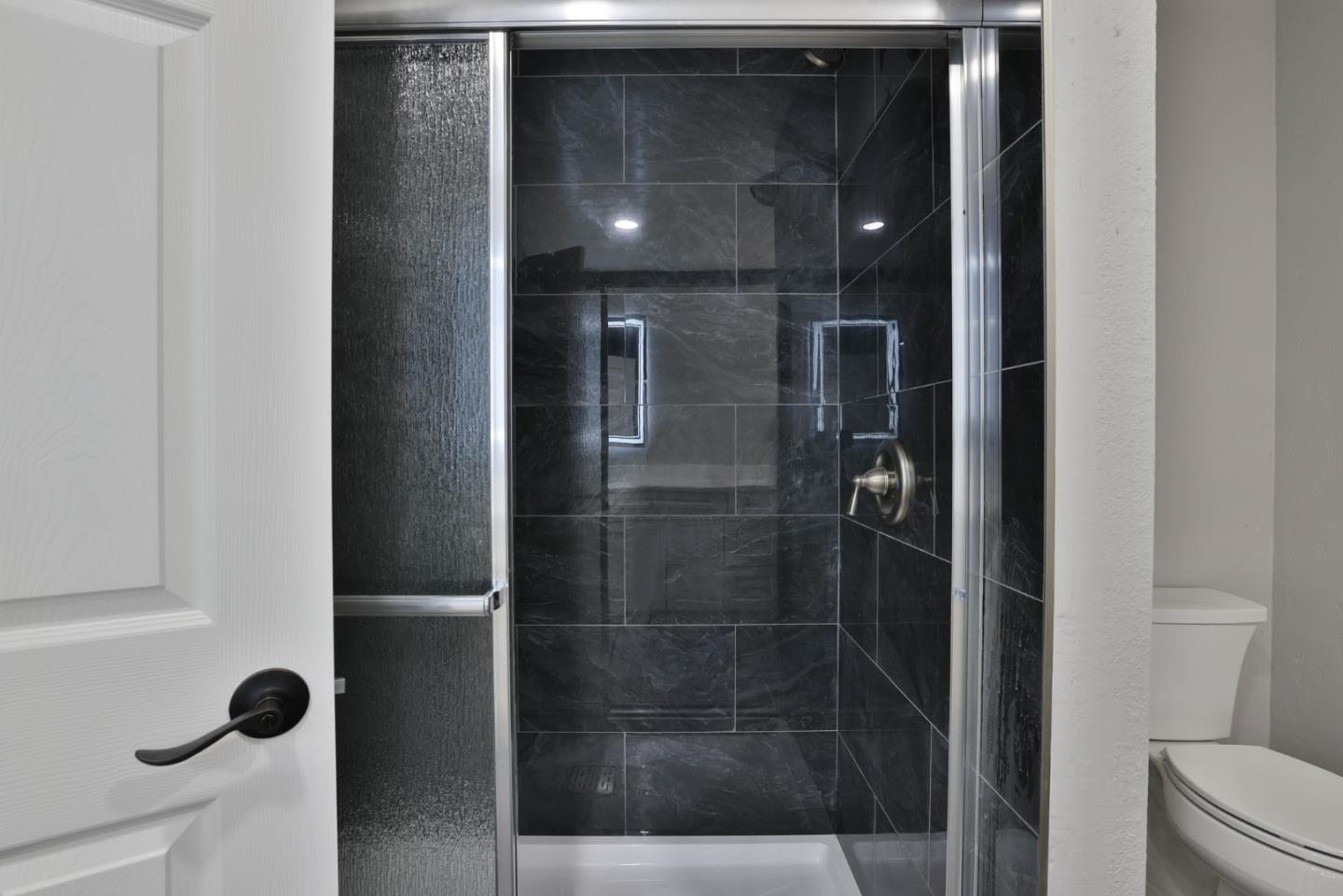 365 San Andreas Drive Milpitas, CA 95035 - Photo 14 of 26 a bathroom with a shower