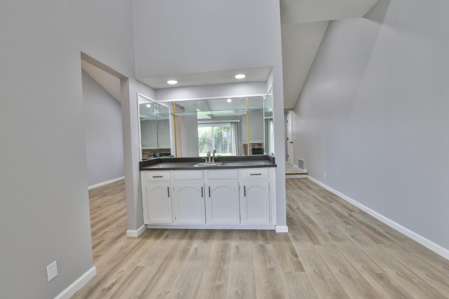 365 San Andreas Drive Milpitas, CA 95035 - Photo 17 of 26 a bathroom with a sink a mirror and a shower