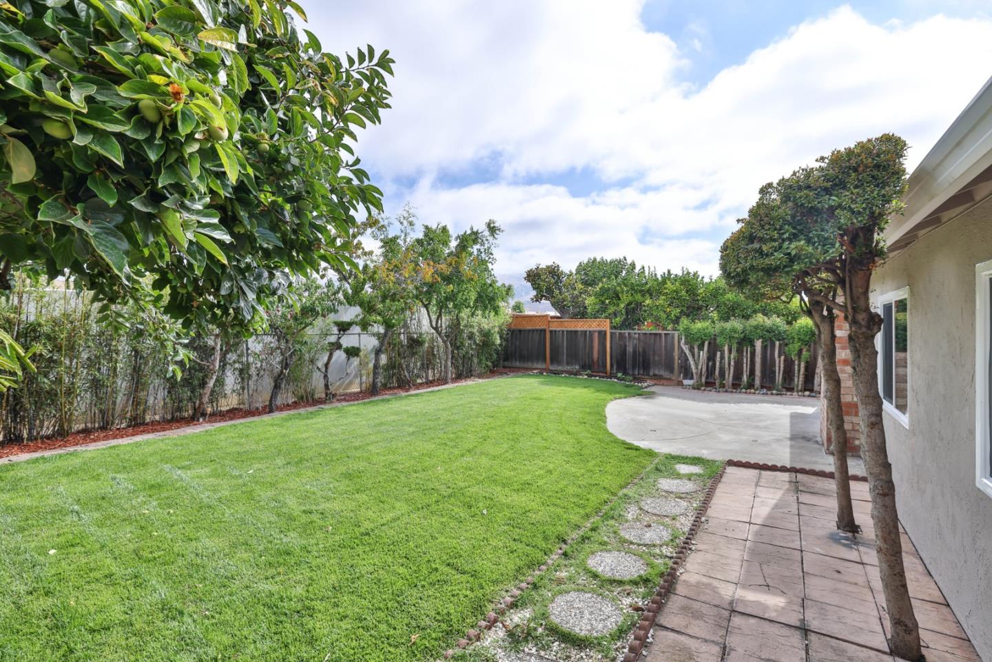365 San Andreas Drive Milpitas, CA 95035 - Photo 22 of 26 a view of a backyard with pathway