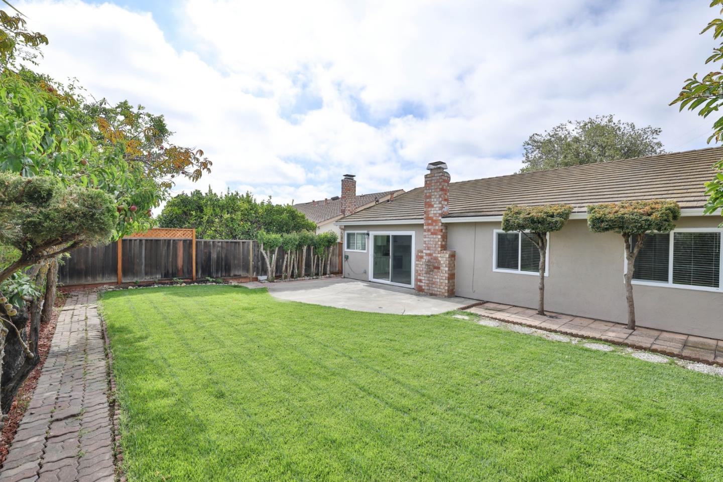 365 San Andreas Drive Milpitas, CA 95035 - Photo 24 of 26 a front view of house with a garden