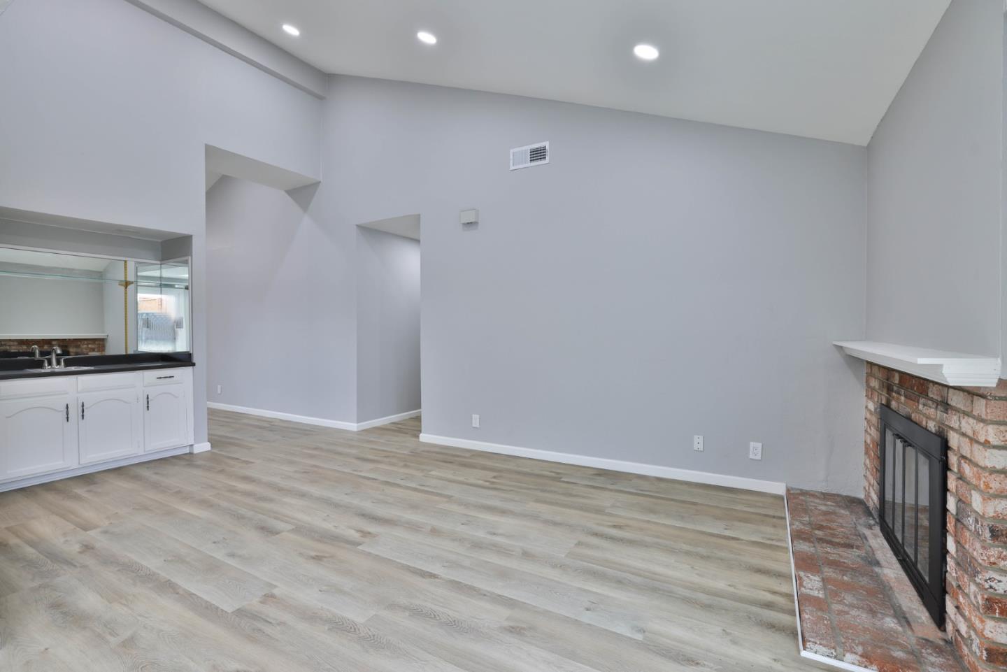 365 San Andreas Drive Milpitas, CA 95035 - Photo 7 of 26 a view of kitchen with wooden floor and electronic appliances