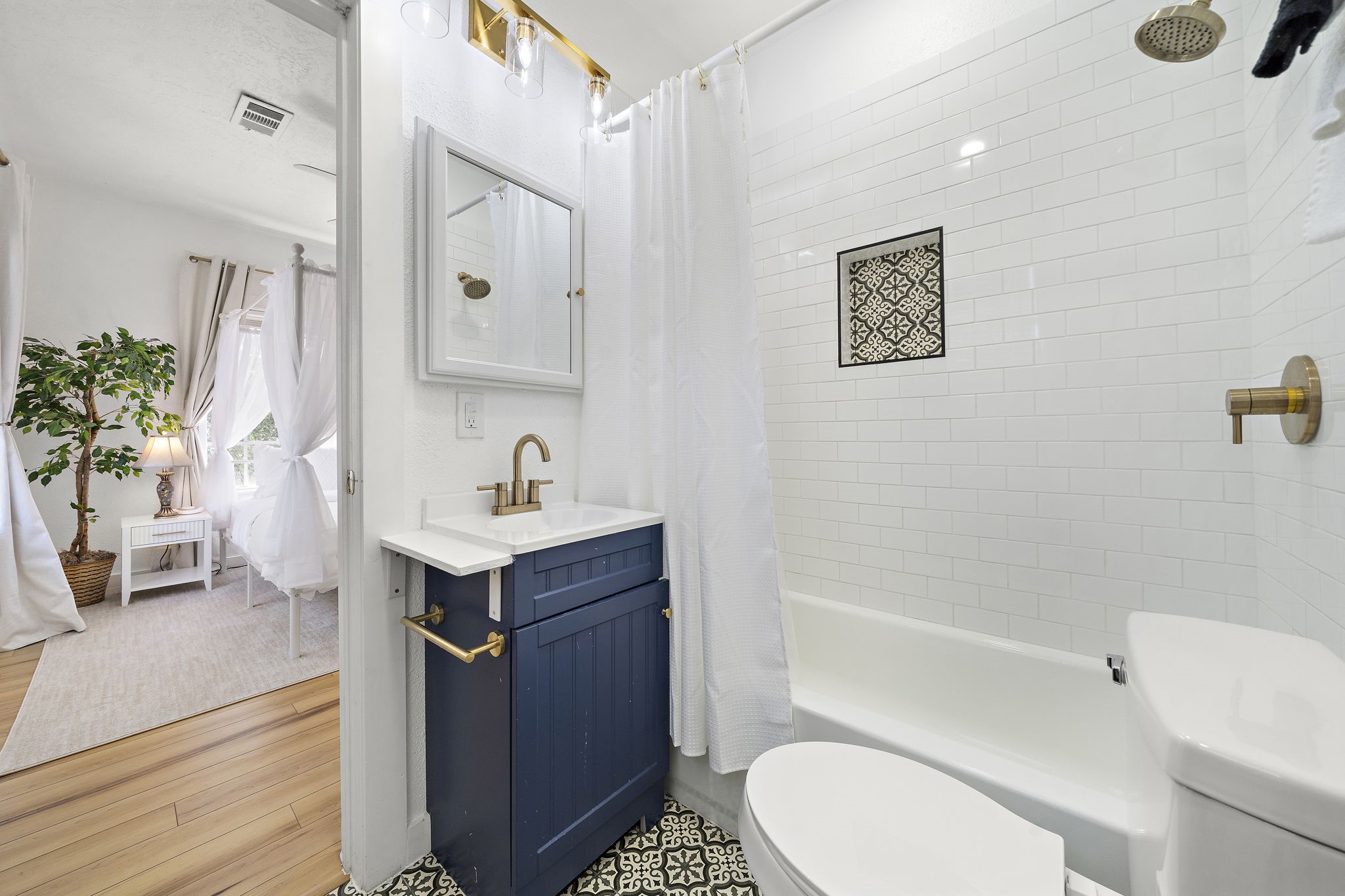 3901 Dallas Street, Unit D Houston, TX 77023 - Photo 13 of 35 a bathroom with a sink toilet and shower