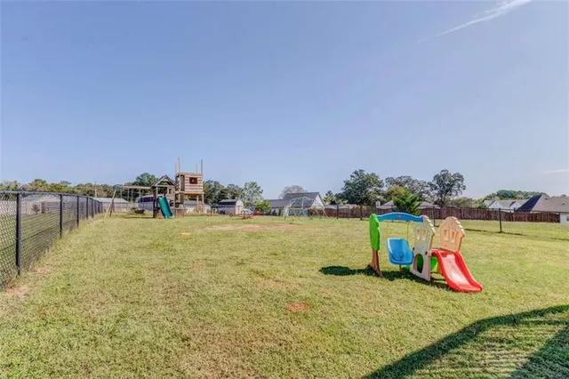 a house view with a outdoor space