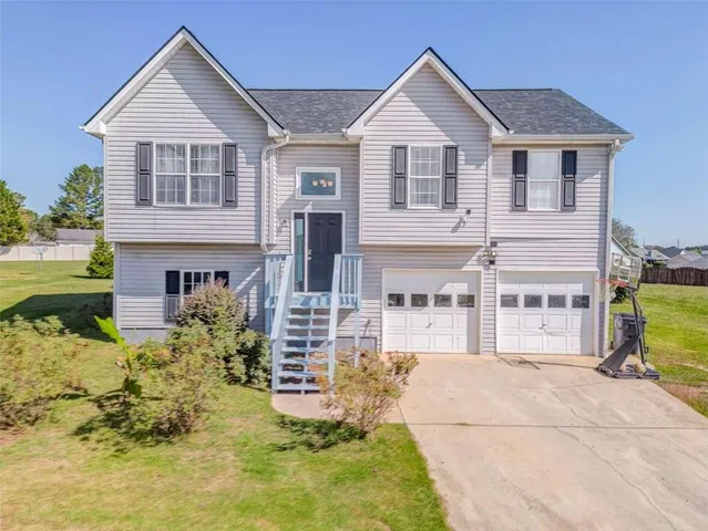 aerial view of residential houses with outdoor space